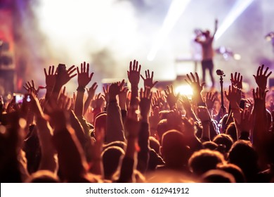 crowd at concert - summer music festival - Shutterstock ID 612941912