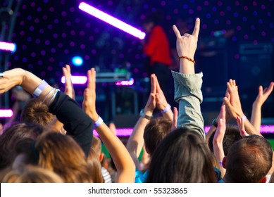 Crowd of fans at a music concert - Shutterstock ID 55323865