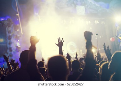 Crowd, Happy People Enjoying Rock Concert, Raised Up Hands And Clapping Of Pleasure, Active Night Life Concept
