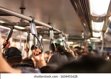 Crowd inside the train in rush hour - Shutterstock ID 1634451628
