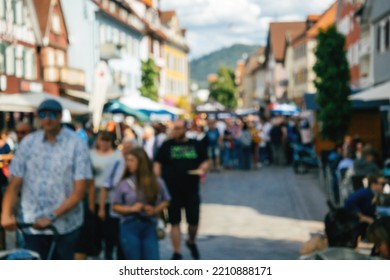 Crowd On Busy Street In German French Italian Swiss Village - Unrecognizable Blur People Silhouette Sightseeing