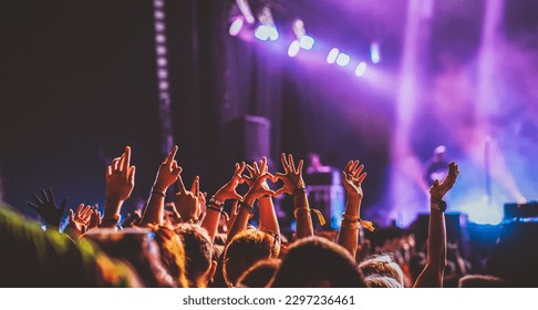 crowd partying stage lights live concert summer music festival - Shutterstock ID 2297236461