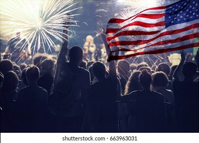 Crowd of people celebrating Independence Day. United States of America USA flag with fireworks background for 4th of July - Shutterstock ID 663963031