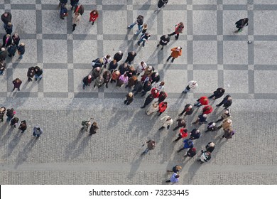 Crowd Of People In Center Of Town, Top View