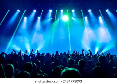 crowd of people dancing at concert - Powered by Shutterstock