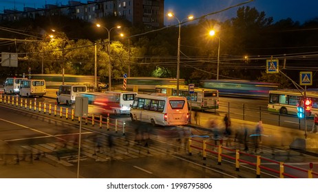 The crowd of people in the queue for the bus at rush hour  in the end of the working day