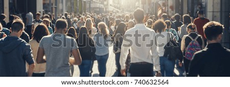crowd of people in a shopping street