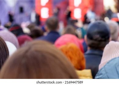 A Crowd Of People At A Street Music Concert Defocusing, Selective Focus