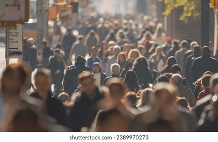 Crowd of people walking city street - Powered by Shutterstock