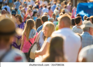 Crowd Of People Walking On The Busy City Street. 