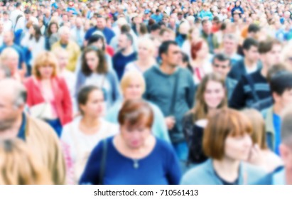 Crowd Of People Walking On The City Street