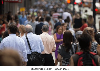 Crowd Of People Walking On Street Sidewalk In New York City