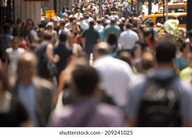 Crowd Of People Walking On Street Sidewalk In New York City