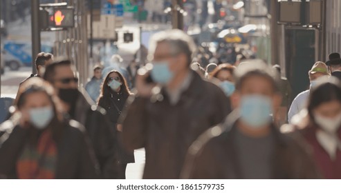 Crowd Of People Walking Street Wearing Masks During Covid19 Pandemic In New York City