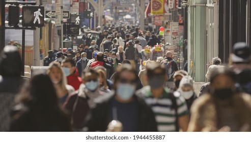 Crowd Of People Walking Street Wearing Masks During Covid 19 Pandemic