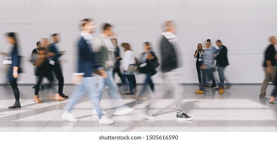 Crowd Of People Walking At Trade Fair