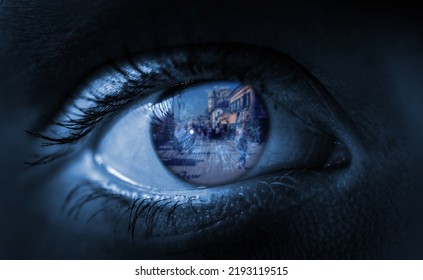 Crowd At Street Reflected In Human Eye. Selective Focus.