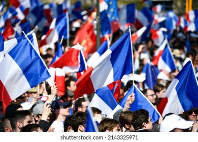 The crowd and supporters with french flags during the campaign meeting (rally) of French presidential candidate Eric Zemmour, on the Trocadero square in Paris, France on March 27, 2022.