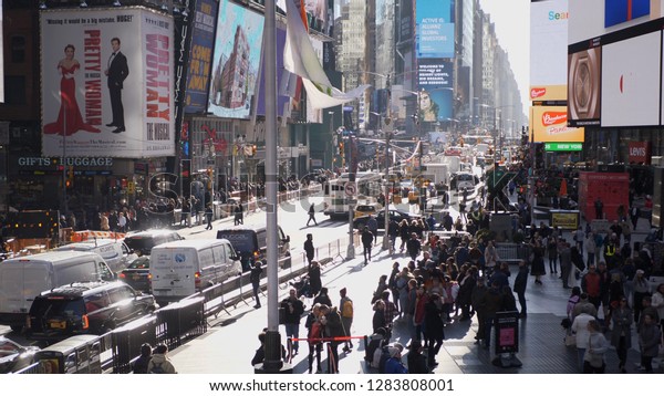 Crowd at Times Square Manhattan a busy place -\
NEW YORK / USA - DECEMBER 4,\
2018