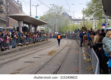 Crowd At Tram Station Bellevue At Spring Festival Named Sechseläuten At City Of Zürich On A Cloudy Spring Day. Photo Taken April 25th, 2022, Zurich, Switzerland.