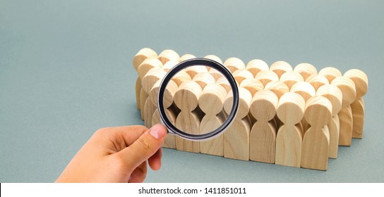 The crowd of wooden figures of people. Concept of business team. Labor collective. Teamwork. Employees. Human Resource Management. Labor market. Demographic situation. Population - Shutterstock ID 1411851011