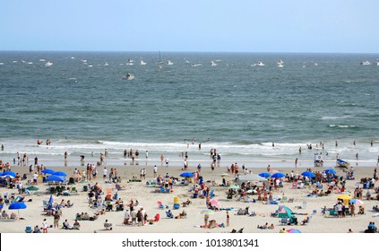 crowded beach scene
 