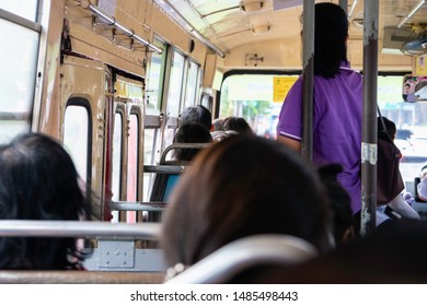 Crowded People Taking A Bus, The Cheapest Way To Travel Around Bangkok.