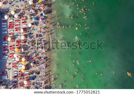 Similar – Luftballonaufnahme von Menschen, die Spaß und Entspannung am Costinesti-Strand in Rumänien am Schwarzen Meer haben.