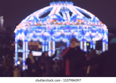 Crowded square with christmas illumination at night blur - Powered by Shutterstock