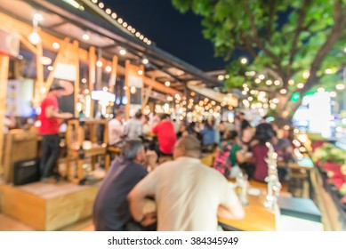 Crowded Traveler In Pub At Thailand Blur