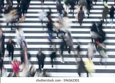 
Crowds crossing the intersection of big city Tokyo