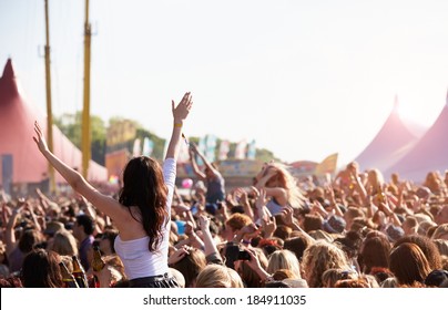 Crowds Enjoying Themselves At Outdoor Music Festival - Shutterstock ID 184911035