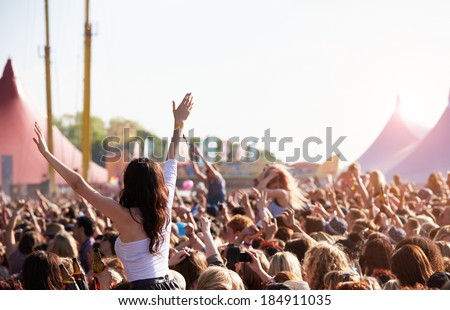 Crowds Enjoying Themselves At Outdoor Music Festival