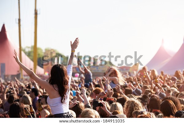 Crowds\
Enjoying Themselves At Outdoor Music\
Festival