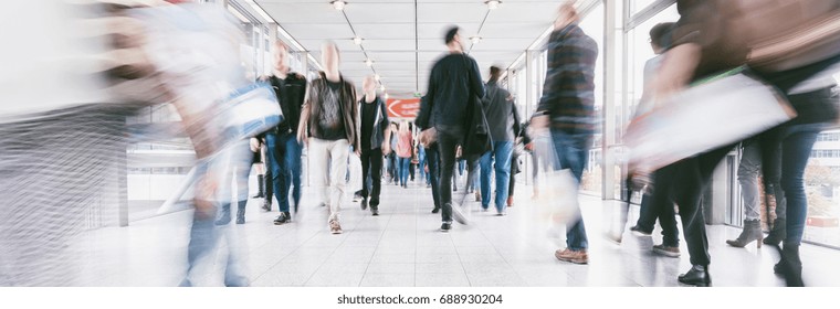 Crowds Of People Walking In A Shopping Mall