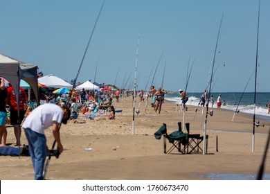 The Crowds Surf Fishing At Gordons Pond. Rehoboth Beach, DE, USA 6-13-2020.