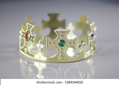 Crown Fantasy With Jewels On The Table - Crown Of A King, Prince, Queen Or Queen On The Table With Red, Green And Blue Jewels
