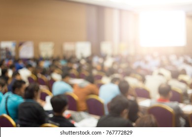 Crown Is Listening The Speaker Giving Talk At Business Meeting. Audience In The Conference Hall. Business And Entrepreneurship. Copy Space On White Board.