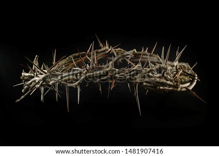 Crown of thorns with dramatic light isolted over dark background