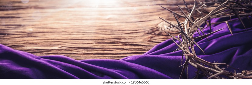 Crown Of Thorns And Purple Robe On Wooden Floor With Sunlight - Crucifixion Of Jesus Christ