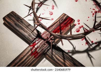 Crown Of Thorns, Wooden Cross And Blood Drops On Light Background. Jesus Christ's Sacrifice And Atonement Of Our Sins