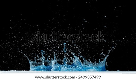 Crown Water splash on object to create shape form fluttering in droplet and wave. Crown water to object make curve drop explosion in ripple motion. Black background isolated