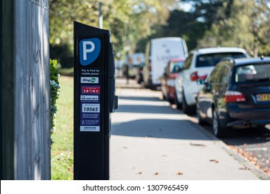 Croydon, Greater London - Nov 15 2018 : Parking meter in London accepting payments by card, app, cash or telephone