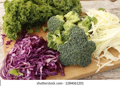 Cruciferous Vegetables. Different Types Of Cabbage On A Wooden Board.
