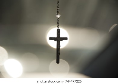 Crucifix in center of spotlight