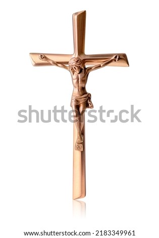 Crucifix with a metal figure of Jesus Christ for prayer. Close-up of a  crucifix with a cross. Christian religious symbol. Crucifix isolated.