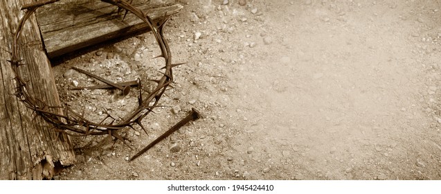 Crucifixion Of Jesus Christ. Cross With three Nails And Crown Of Thorns on ground.