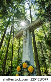 Crucifixion Of Jesus Christ With Sun Rays, Korytnica Spa Area, Slovakia, Slovak Republic. Religious Symbol.