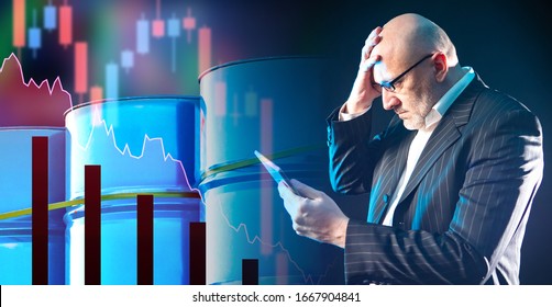 Crude Oil Price Fall. Investor With A Tablet In His Hands. Man Saw The Dynamics Of Oil Prices. Schedule On The Background Of Barrels Of Petroleum Products. Decrease In Sports Led To Lower Gas Prices