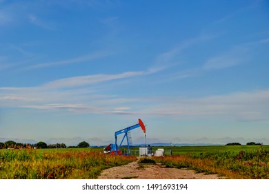 Crude Oil Pump Jack In A Field In Alberta